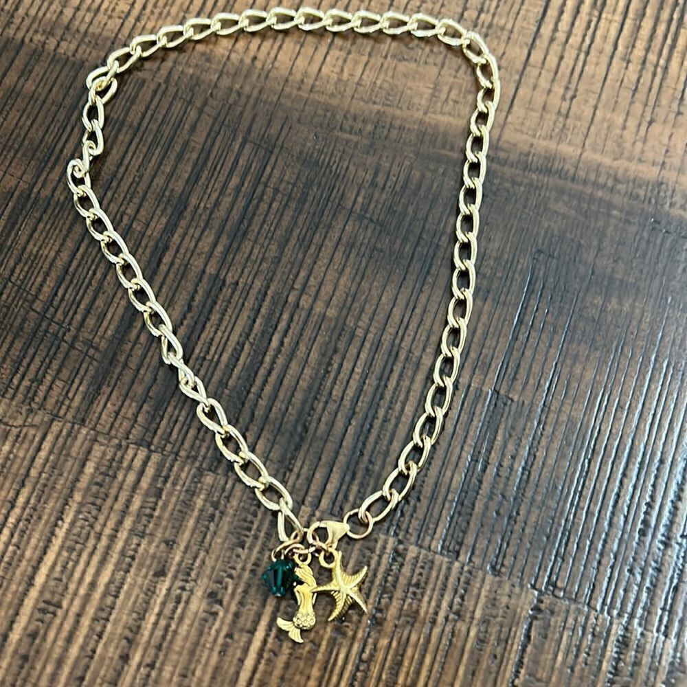 Pretty goldtone charm choker